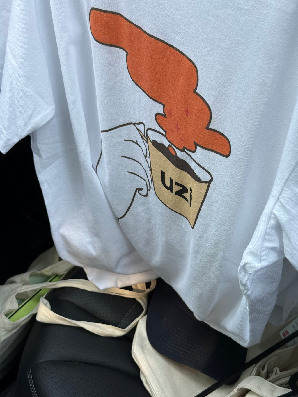 Uzis tees Salty Blonde cafe drop tee